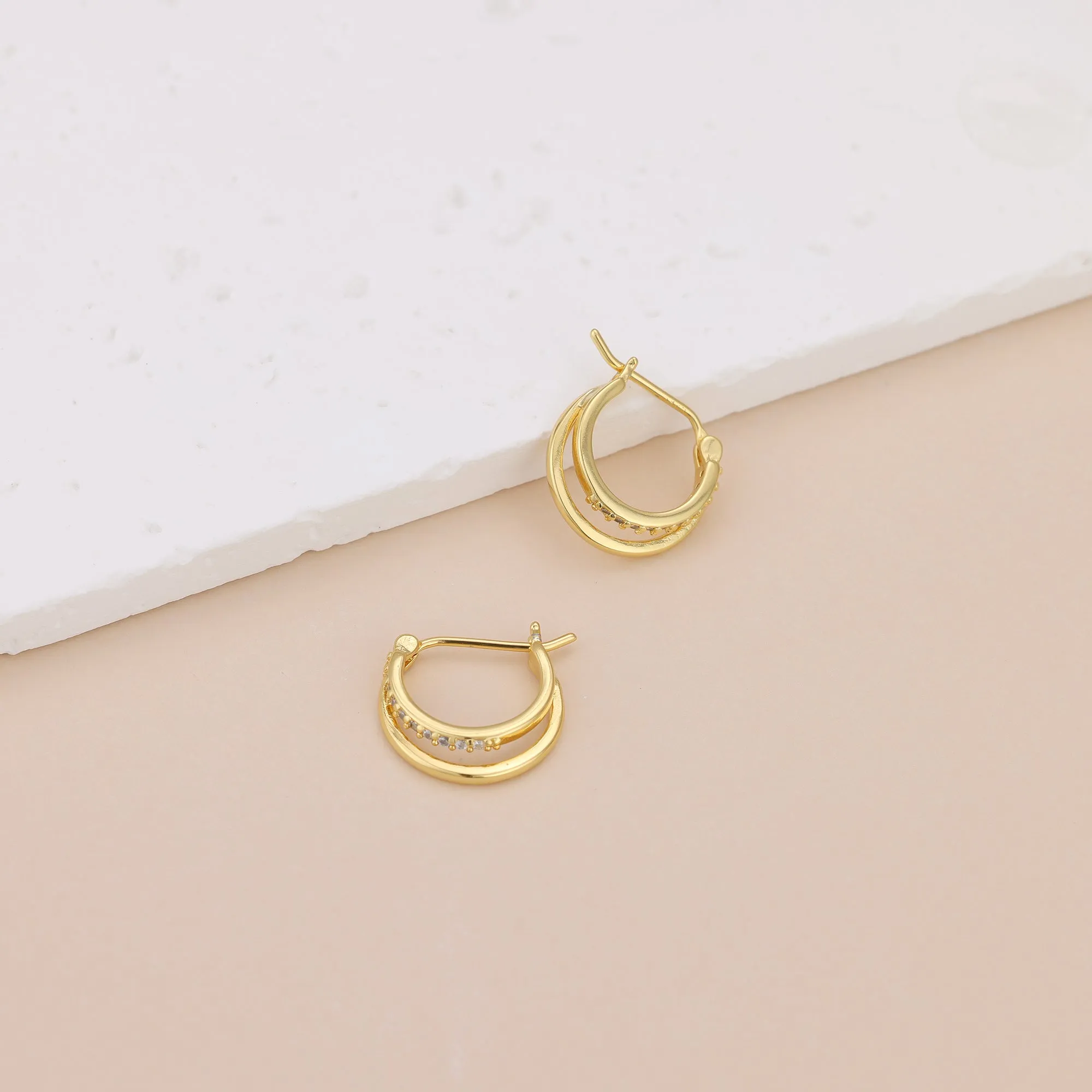 E072 paved double huggie hoop earrings